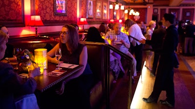 Guests settled in for dinner during a private event.