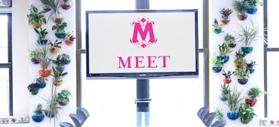 Unique details include a plant-based installation.