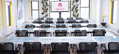 Penthouse set up classroom style for 36 guests.