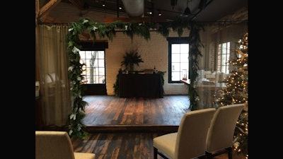 Wedding ceremony setup on the second-floor stage.