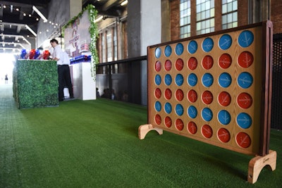 The party featured a variety of life-size games for guests, including a red-and-blue version of Connect Four.