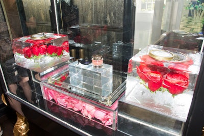 Caviar chilling on ice sculptures with frozen roses highlighted Lancôme’s high-end, luxe skin products.
