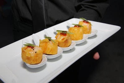 Asian-style spoons served shrimp dumplings with lemon ponzu and scallions.