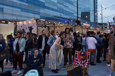 Carnival stringers hung over a crowd of guests Ford identified as 'young and dynamic' at Made L.A. in downtown Los Angeles.