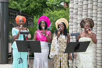 Stationed near the zoo's entrance, Ugochi and the Afro Soul Ensemble sang as guests arrived.