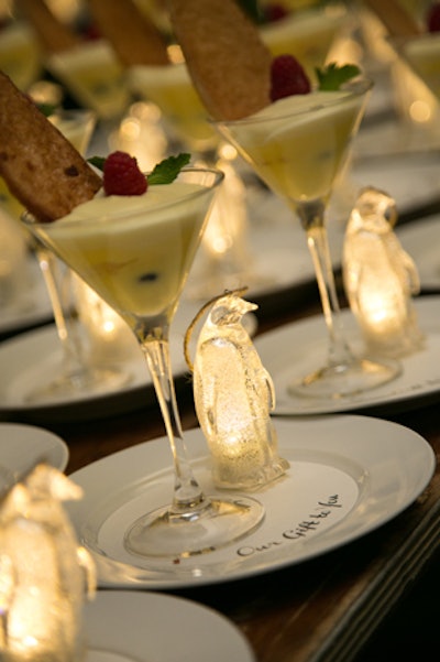Dessert, a lemon parfait with fresh berries, was accompanied by glowing penguin ornaments.