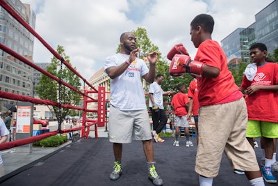 Professional boxer Mike 'Yes Indeed' Reed worked out with kids from the local Boys & Girls Club at Olympic Day DC.