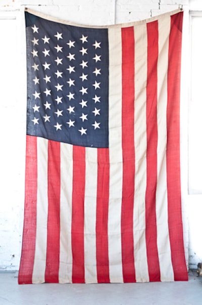 Patina Rentals offers several styles of vintage American flags ($65 per day) for event use.