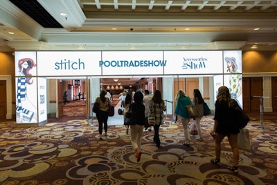 An illuminated entryway bore the names of various shows within one of two venues.