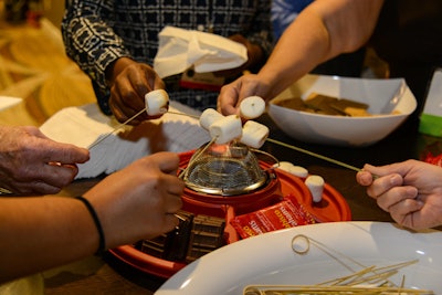 Further emphasizing the popularity of the food station, sponsor Sterno set up s'mores stations as part of the event's luncheon on August 15. Guests could roast their own marshmallows over the Sterno flame, and then build their s'mores with the graham crackers and chocolate provided.