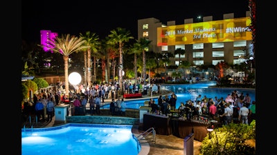 An outdoor closing party at the Hyatt Regency Orlando pool deck.