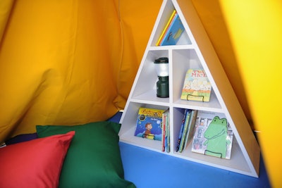 The tents had a variety of classic Houghton Mifflin Harcourt stories on a triangular bookshelf.