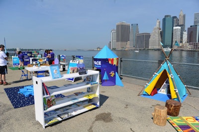 The experience's Story Camp station featured tented libraries that offered story time sessions for parents and their kids.