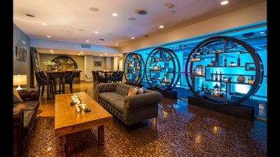 The secluded wine room includes custom built furniture and 250,000 pennies covering the floor.