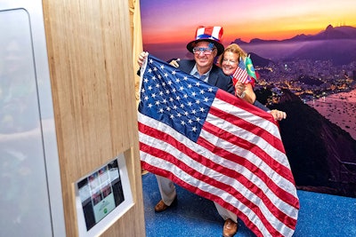 A photo opportunity offered props representing the United States and Brazil, including flags, hats, and sunglasses in the colors of each country.