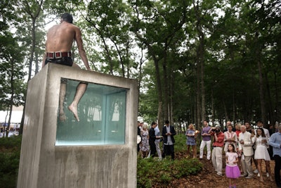 One of the most Instagrammed moments of the night, John Margaritas's 'One Ton Tank' featured a hand-poured concrete tank filled with water. The tank's windows created 'an almost prismatic light effect' as a performed in a black speedo performed while being weighed down with weights.