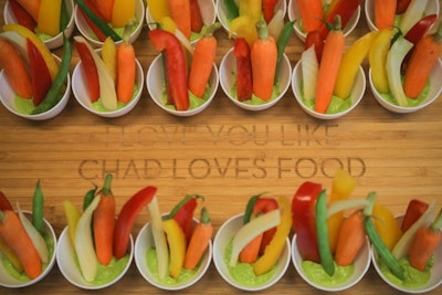 Crudite sat on a cutting board emblazoned, 'I love you like Chad loves food.'