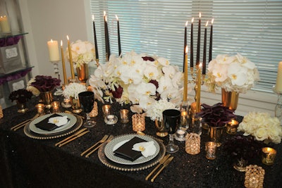 Taper candles, white orchids, and fancy china decorated an opulent tabletop.