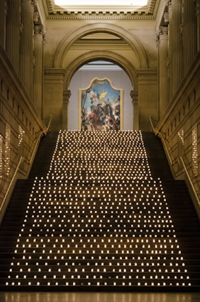 In a more straightforward take on the look, a display of 1,200 votive candles lined the stairs in the Great Hall at the Metropolitan Museum of Art at the opening-night party for Bullets Over Broadway in New York in 2014, greeting the 900 guests as they arrived from the St. James Theatre.