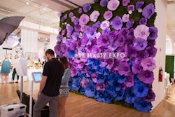 The expo organizers aimed to create an environment that was social-media friendly, including a large paper flower wall as the photo booth backdrop.