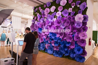 The expo organizers aimed to create an environment that was social-media friendly, including a large paper flower wall as the photo booth backdrop.