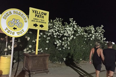 The Coachella Valley Music and Arts Festival in the Southern California desert of Indio has a massive footprint, so guests need clear instructions back to their cars and bikes in remote lots. Guests at this year's event in April found their way back by following long pathways that they could easily identify and remember by color.