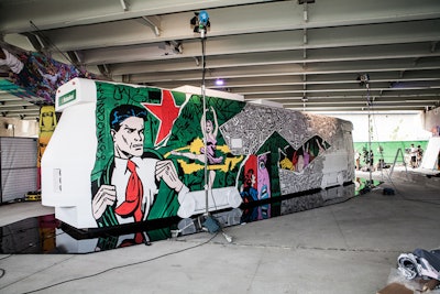 Three Toronto artists painted canvas streetcar replicas using Heineken's color palette.