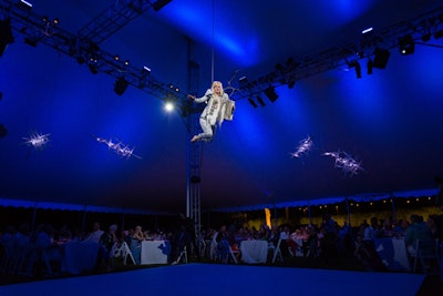 Dinner concluded with a performance by Norwegian artist and vocalist Tori Wrånes, who dazzled guests while suspended from the ceiling. It was followed by a dance party with DJ Mia Moretti featuring an impromptu, surprise performance by Ja Rule.