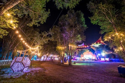 The Bazaar iluminated at night was an after-hours playground of interactive exhibits and entertainment. Encompassed was the La Hacienda stage, curated by artist Dalabil.