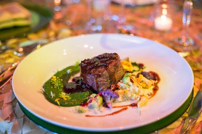 Yellowstone National Park inspired the main dinner course of grilled bison, herbed risotto, and heirloom cauliflower garnished with spinach puree and elderberry sorghum syrup.