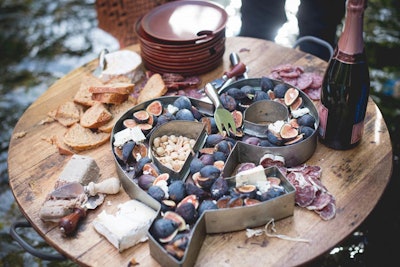 Charcuterie tables featuring the group’s signature ampersand were available for snacking.