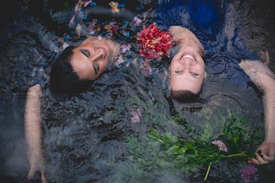 Guests posed in the creek for a series of portraits, which served as party favors.