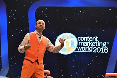 Rather than traditional business attire, Content Marketing Institute founder Joe Pulizzi donned the event's color—orange—for his opening keynote.