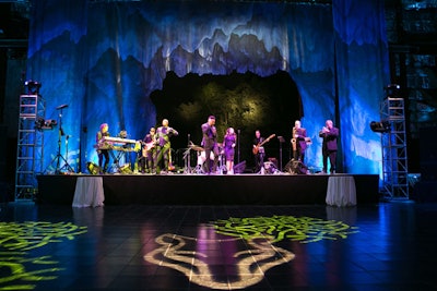 For the performance stage, the production manager for The Barns at Wolf Trap created an open-air backdrop inspired by Glacier National Park.