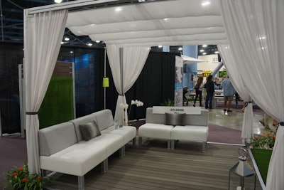 Layze Systems had a display that represented the company's mix of tropical outdoors, modern architecture, and state-of-the-art technology.