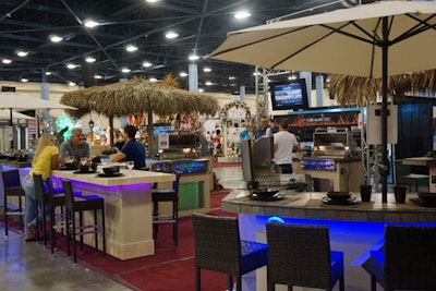 Paradise Grilling Systems had tiki-hut-inspired decor for its product-display area.