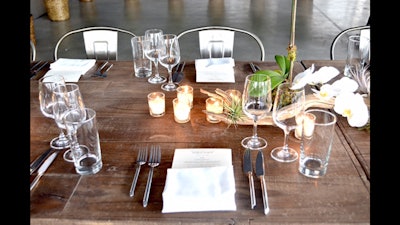 Orchid and votive table setting