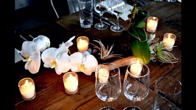 Orchid and votive close up