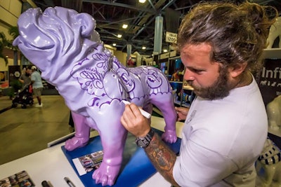 Local street artist Atomik, who painted a bulldog statue for InfinyToon, was one of the attendees at the 2016 Miami Home Design and Remodeling Show, held September 2 to 6 at the Miami Beach Convention Center.