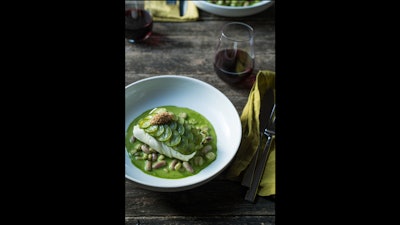 Poached halibut, heirloom beans, basil pistou, and fennel lucky sorrel