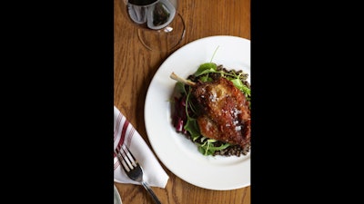 Duck confit with french lentils and bitter greens.