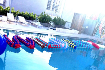 Balloon Express constructed a floating, multicolored display for the Wildfox pool party in the Boulan South Beach pool during Mercedes-Benz Fashion Week Swim in July 2014.
