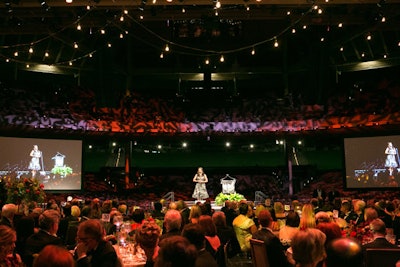 Large 28- by 22-foot screens provided an up-close experience for guests during the speaking program and then showcased images of the national parks throughout the rest of the night.