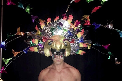 The gala’s main headdress was designed by Lori Warren of Lori Warren Designs and made with fabric from first-responder uniforms and items inspired by tributes left at memorial sites for the Pulse nightclub shooting victims.