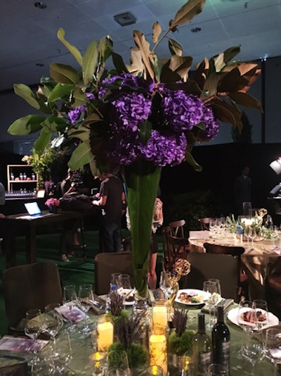 The tallest floral arrangement at the balls will tower from a 40-inch custom trumpet vase.