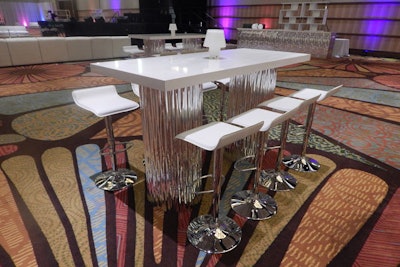 Just Bars recently launched its Mirrored Wave collection, which is available as a designer bar in various configurations, a high-top table, and a communal high-top table. All are available with white or black tops. The collection ranges in price from $150 to $600 and is available for rent in Orlando, Tampa, Naples, and South Florida, Las Vegas, Los Angeles, and San Diego.