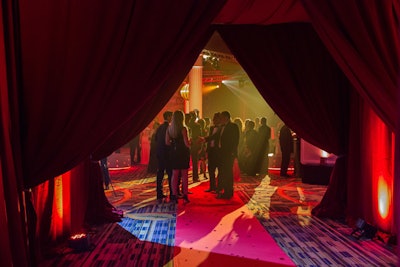 Heavy red drapes and decorative lighting marked the entrance to the V.I.P. pre-party.