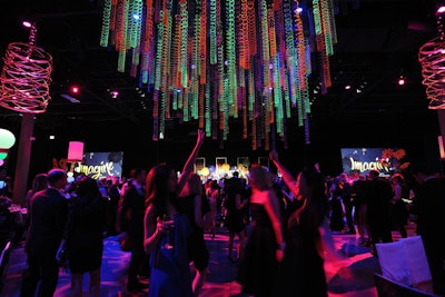 At the Unicef Hope Gala in Chicago in April, designers put an elegant spin on a childlike theme by creating a canopy of suspended neon Slinkys above the dance floor.