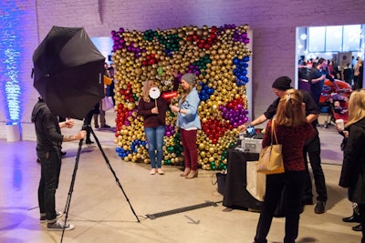 At Tasting Table’s Open Market Chicago event at Revel Fulton Market last December, guests posed in front of a Santa-approved photo booth featuring a wall full of colorful ornaments.
