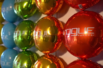 At a Vogue Eyewear launch party, which was held at a private home in Los Angeles in March 2013, a wall of colorful branded Mylar balloons served as an eye-catching step-and-repeat.